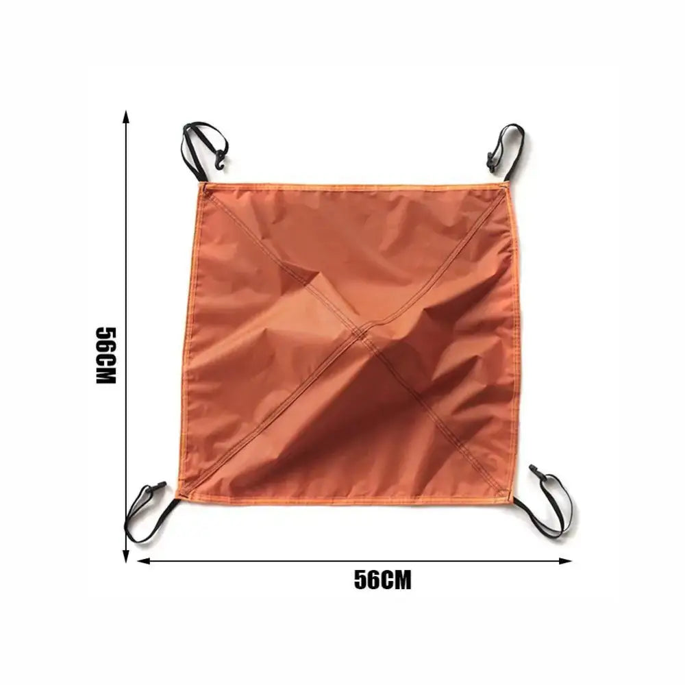 Orange square fabric hammock with metal hooks at each corner.