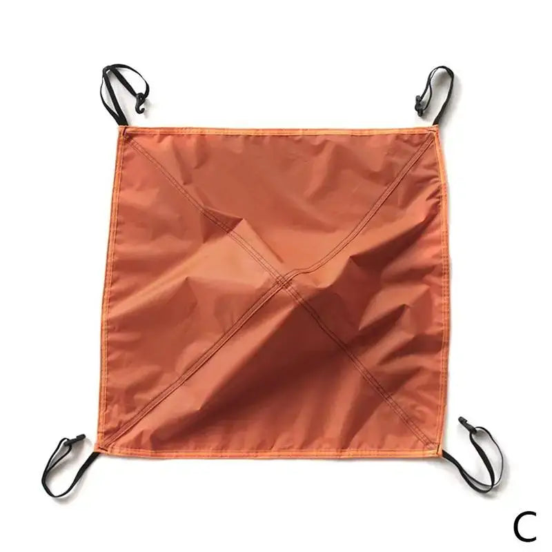 Orange square fabric with metal hooks at each corner.