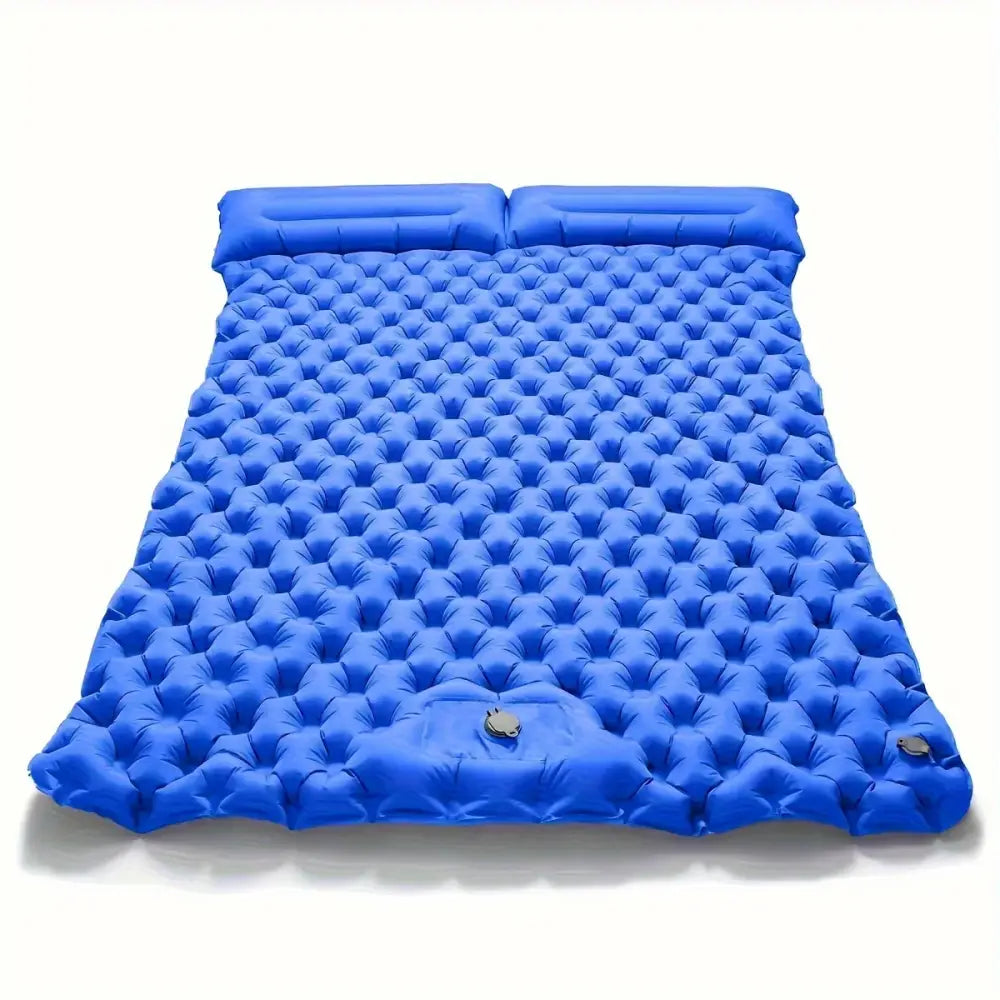 Blue inflatable camping mattress with a textured surface pattern.