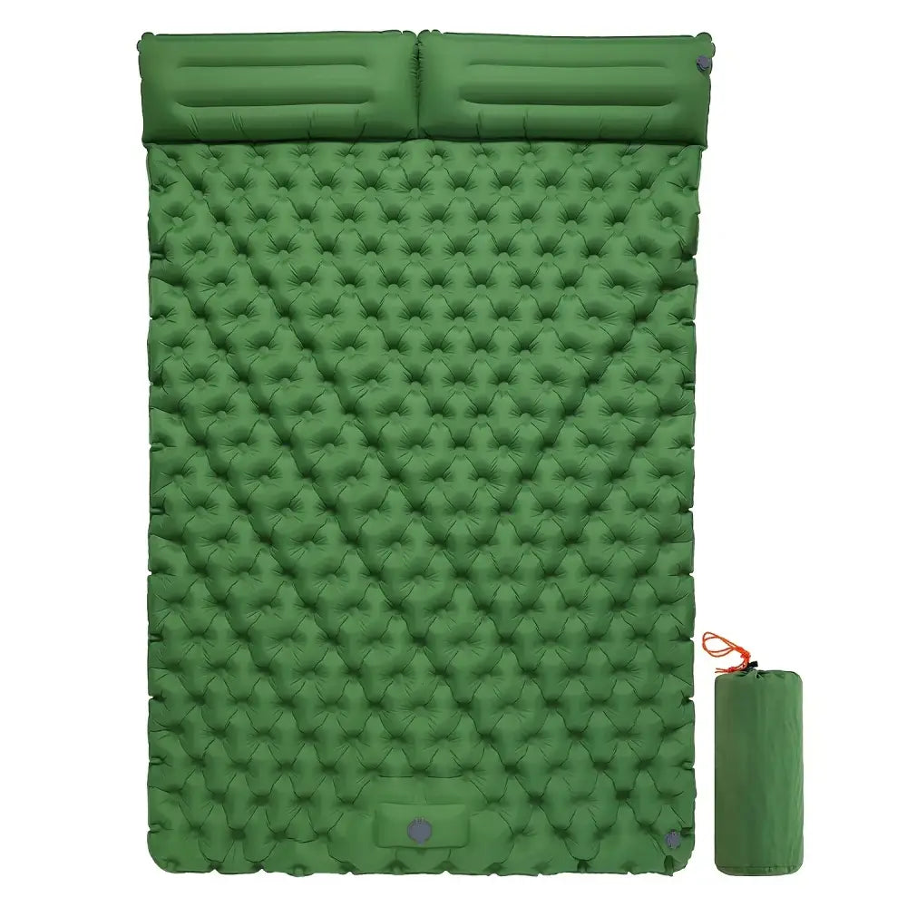 Green inflatable camping sleeping pad with attached pillows and a matching storage bag.