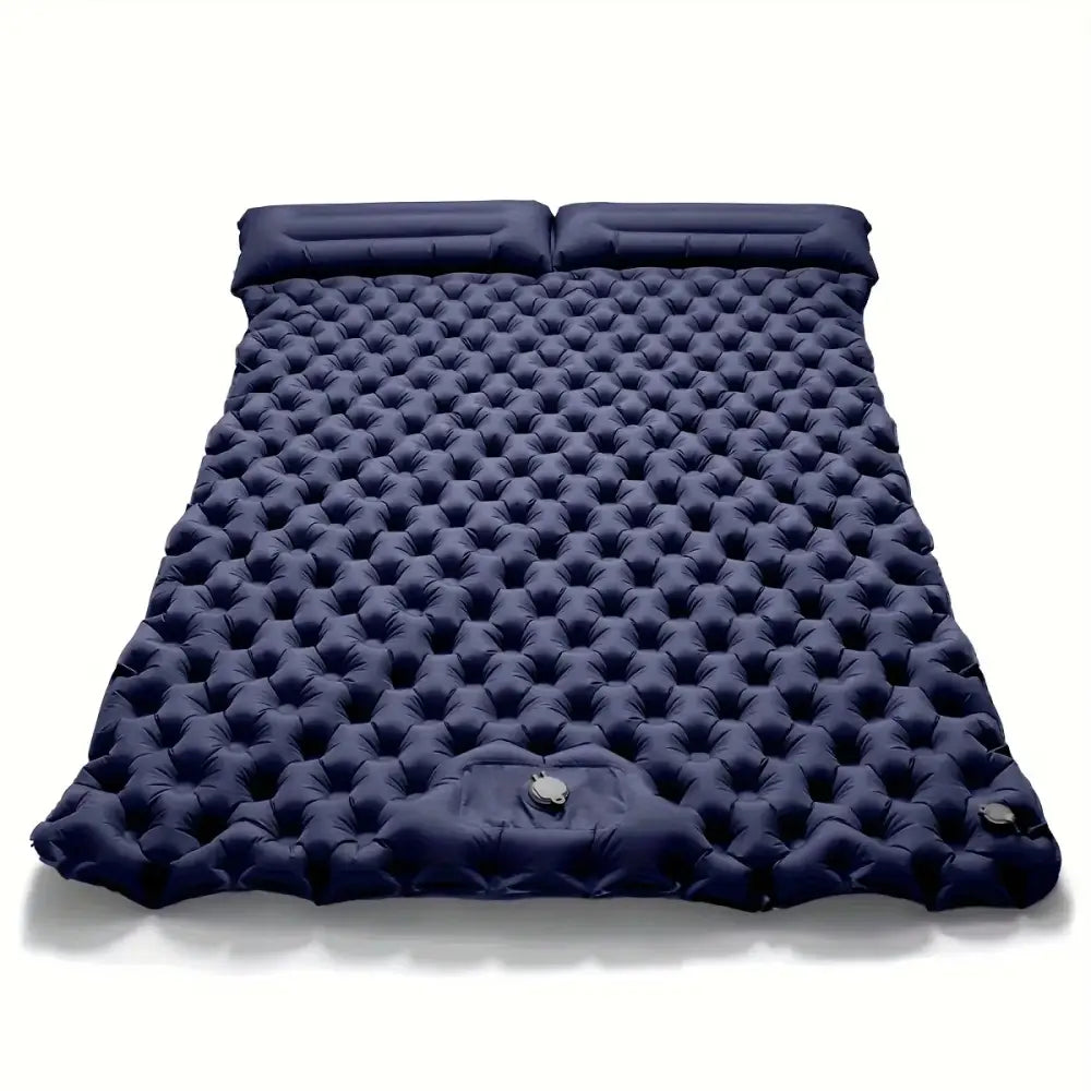 Navy blue inflatable camping mattress with a textured, dimpled surface.