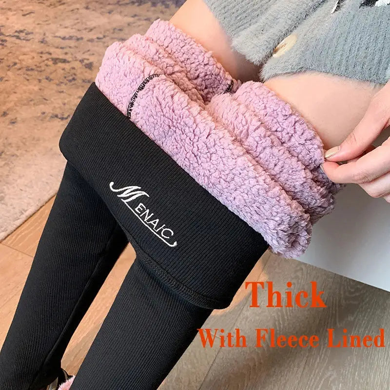 Fleece-lined black leggings with a pink fuzzy waistband.