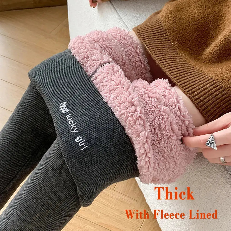 Fleece-lined leggings or tights with a fuzzy pink interior.