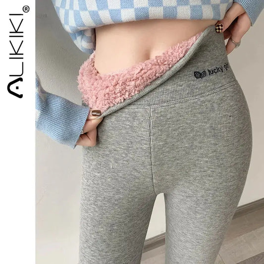 Gray knit leggings or yoga pants with a pink fuzzy waistband.