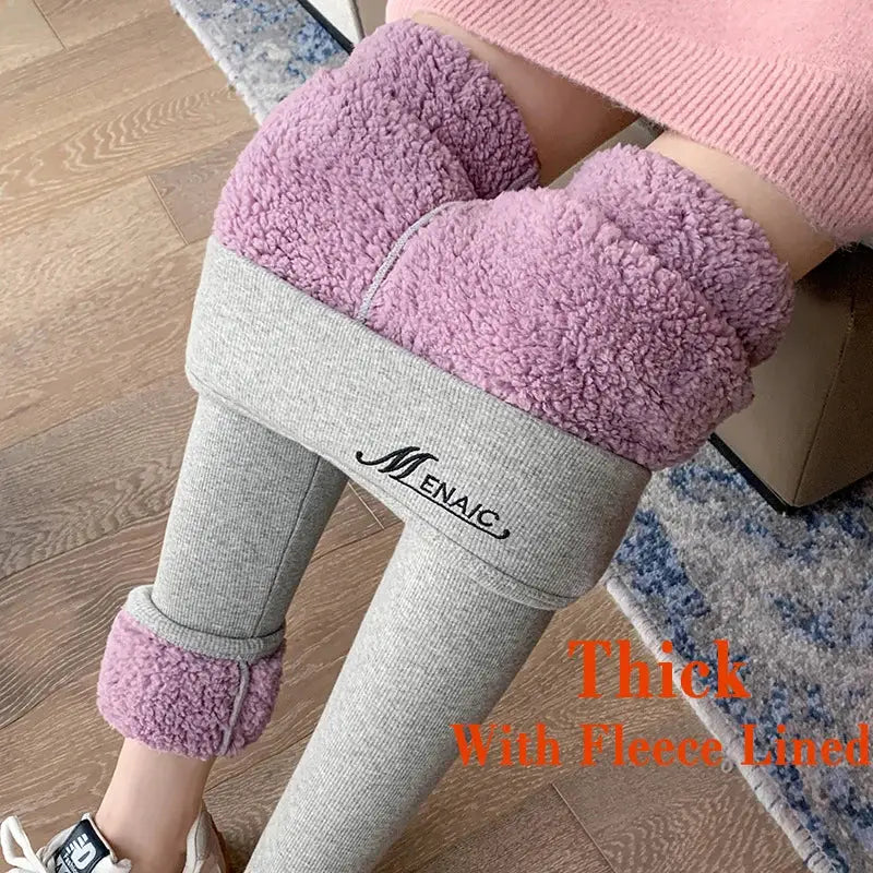 Pair of thick, fleece-lined gray leggings with pink fuzzy cuffs.