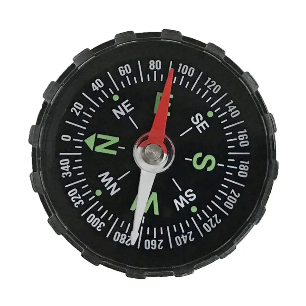 Circular compass with a black face and white markings showing cardinal directions.