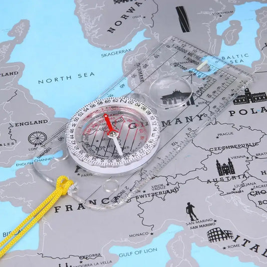 Compass placed on a map of Europe.