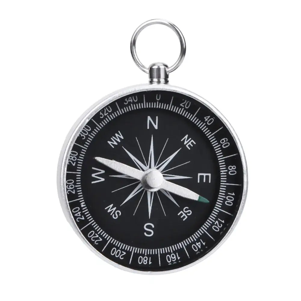 Magnetic compass with a black face and white directional markings.