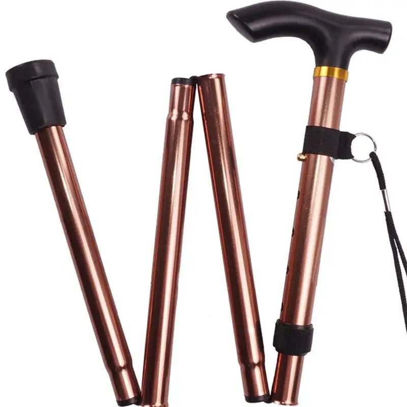 Folding walking cane with a copper-colored metallic shaft and black handle.