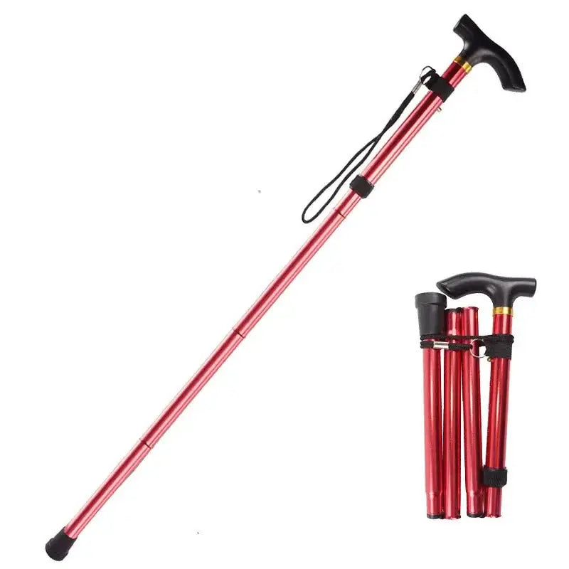 Folding walking cane with a red metallic shaft and black handle.