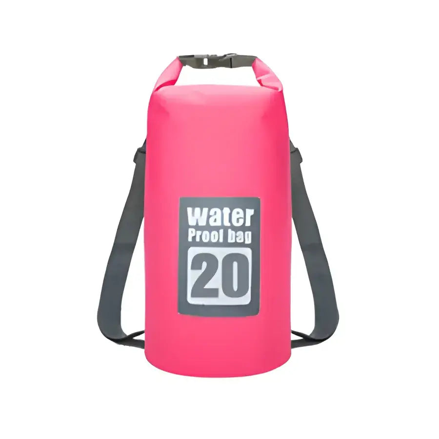 Bright pink waterproof dry bag with ’20’’ printed on it and a shoulder strap.