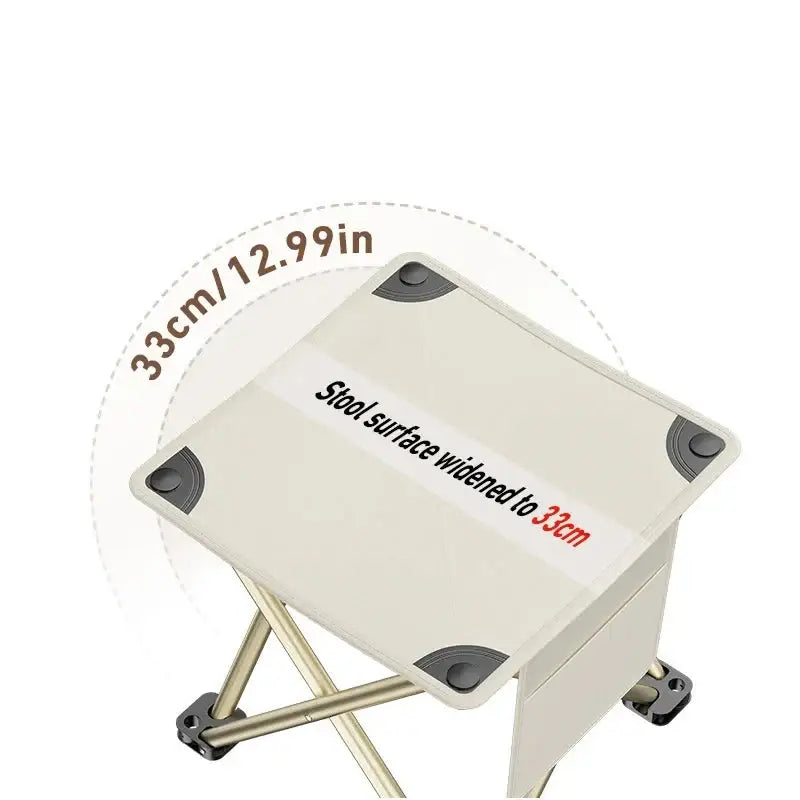 Portable folding stool or seat with a white canvas top and metal legs.