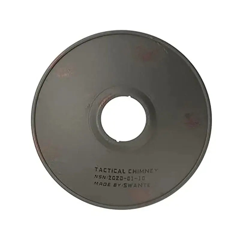 Circular metal disc with a hole in the center, labeled ’TACTICAL CHIMNEY’.