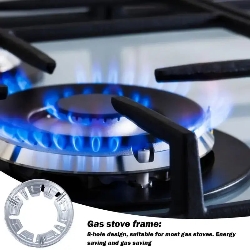 Gas stove burner with blue flames burning.