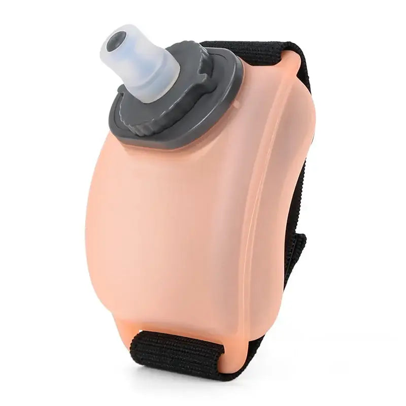 Peach-colored handheld water bottle with a gray cap and black strap.