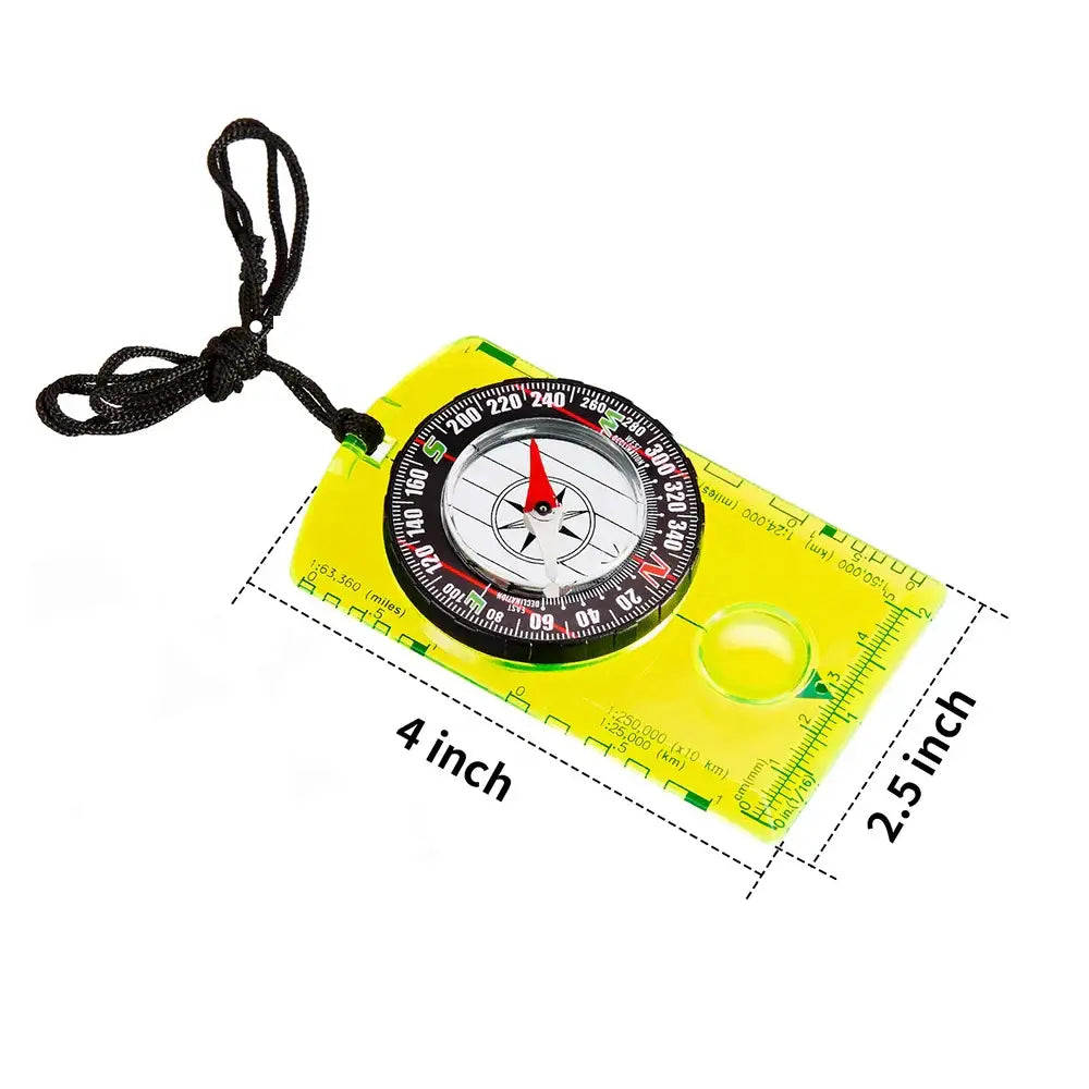 Bright yellow compass with a black cord attached.