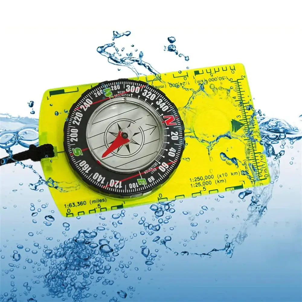 Yellow waterproof compass with a clear dial and black markings.