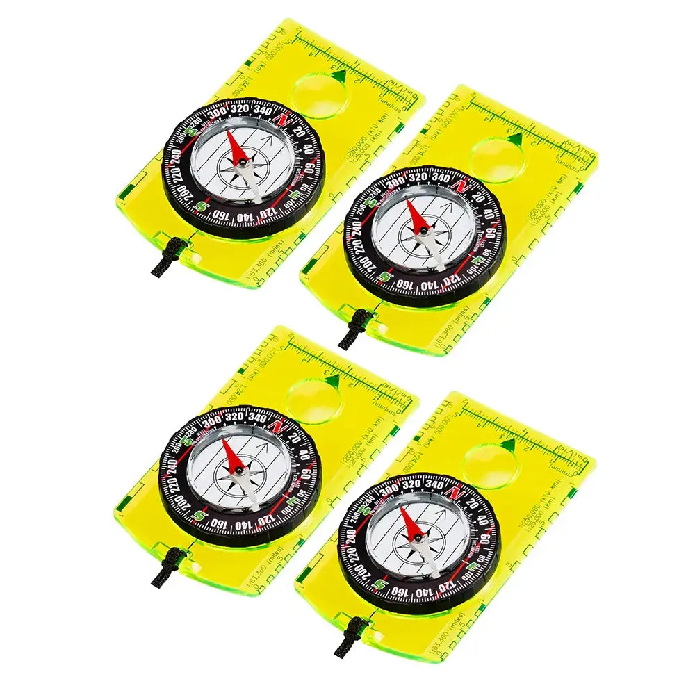 Four yellow handheld compasses with black and white dials.