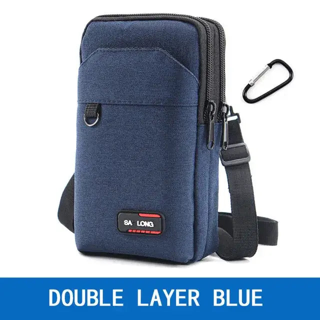 Blue fabric shoulder bag with multiple compartments and a carabiner clip.